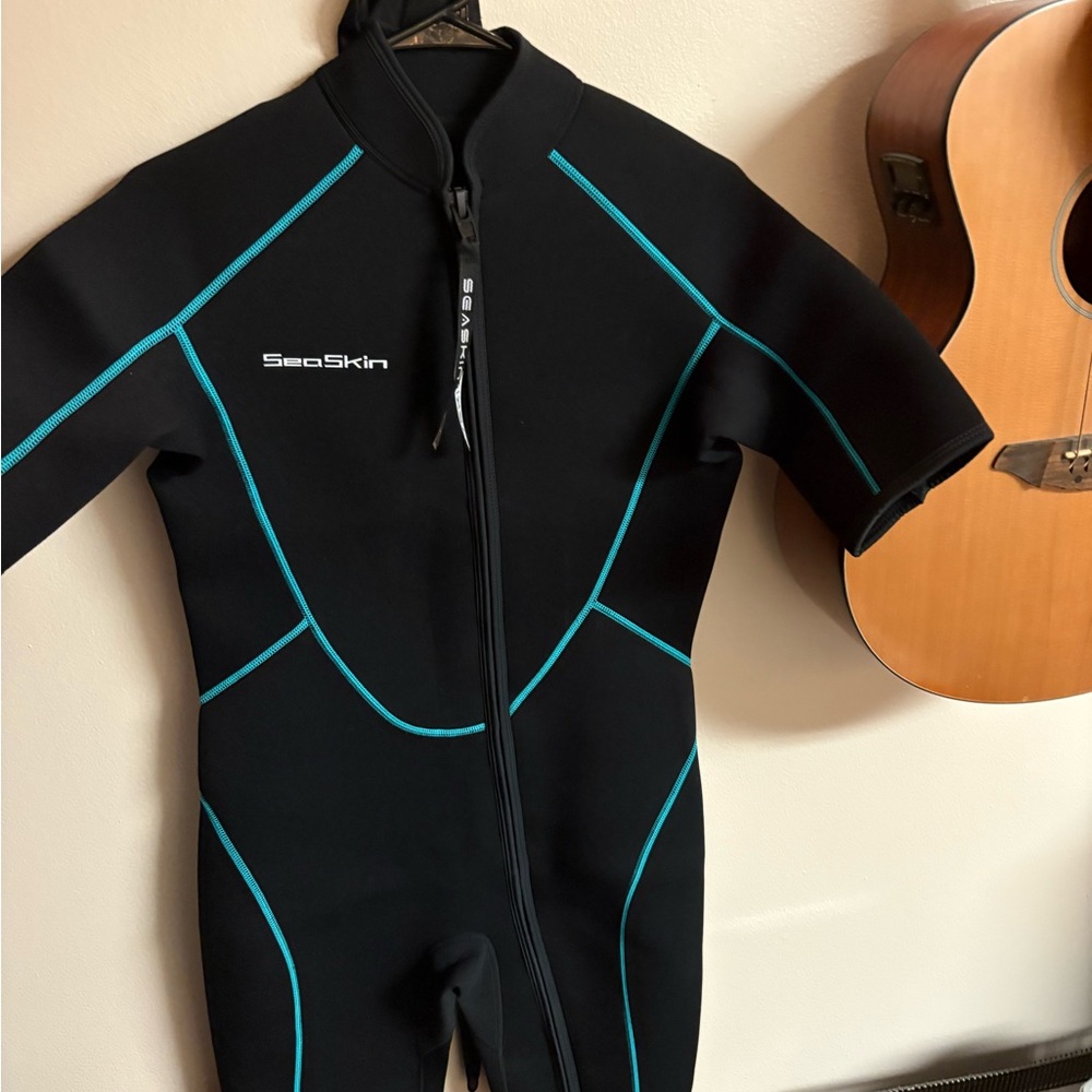 SeaSkin wetsuit great for warmer waters Rashguard - Black with Blue Accents